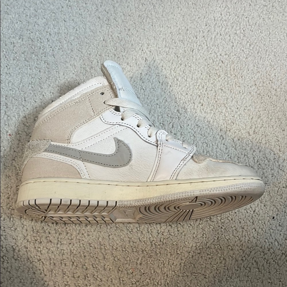 Jordan White and Gray Sneakers with Classic High-Top Design